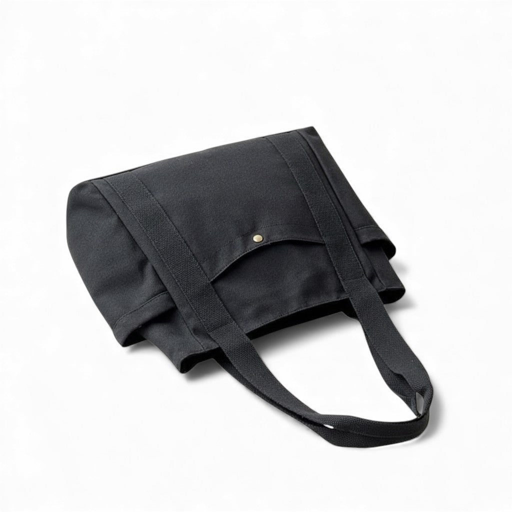 Black bag with a strap on a white background