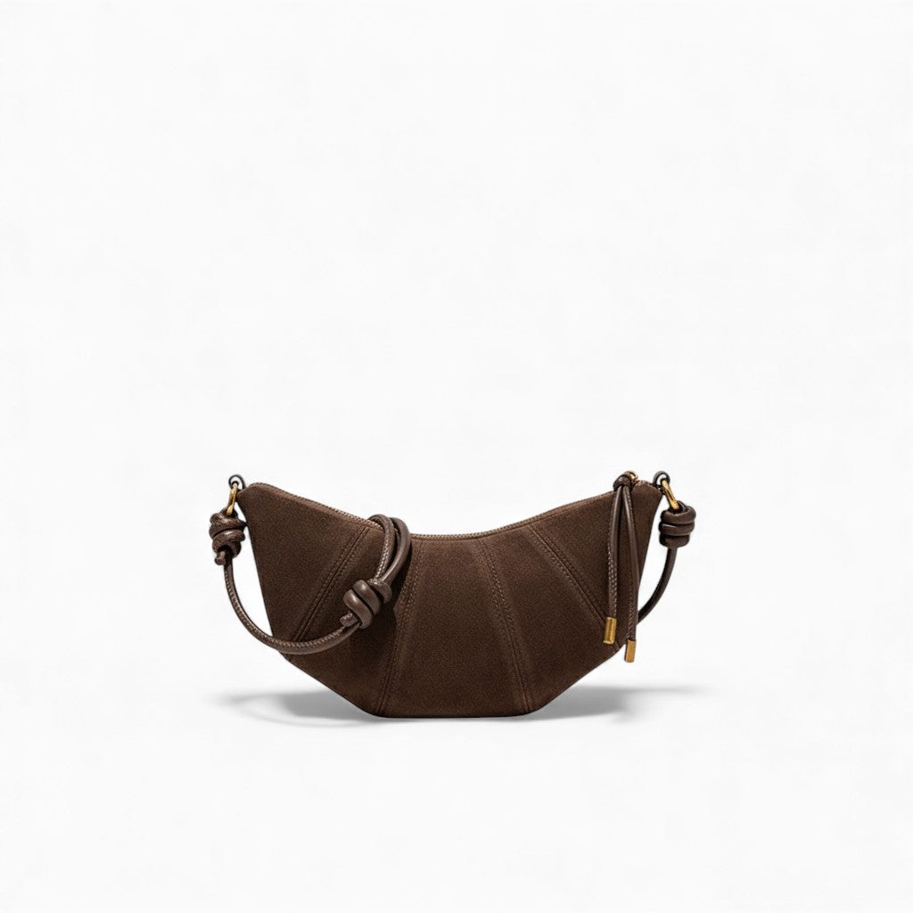 Brown handbag with a strap on a white background