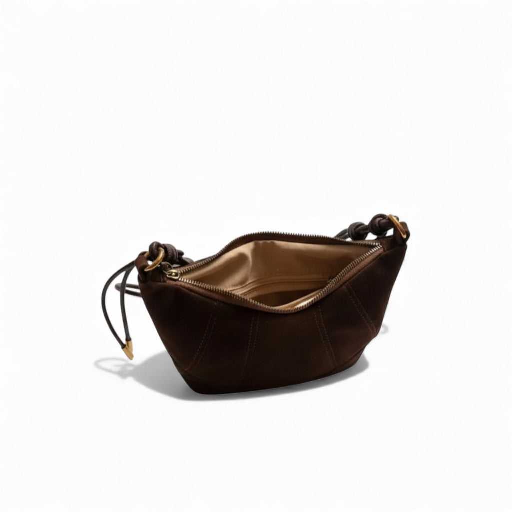 Brown leather bag with a drawstring on a white background