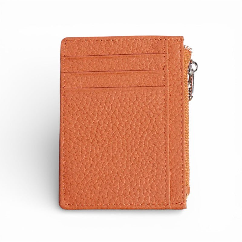 Orange textured wallet with a zipper on a white background