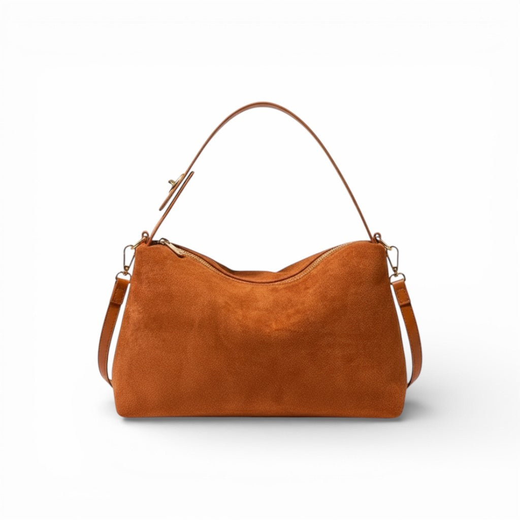Brown leather handbag on a white background