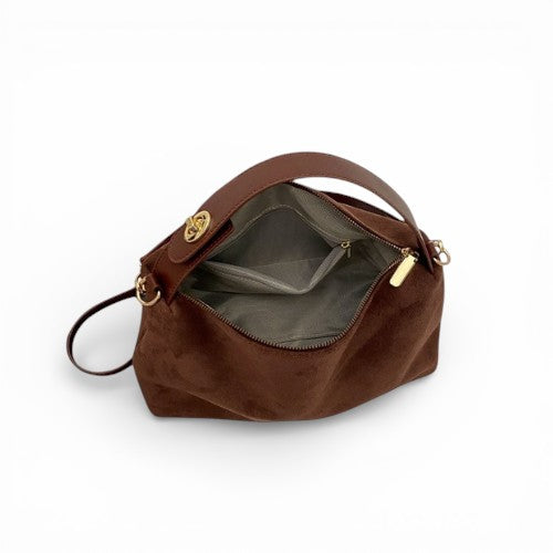 Brown handbag with gold accents on a white background